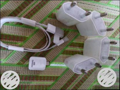 Four Apple USB Power Adapters