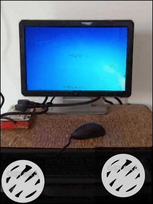 Black Flat Screen Computer Monitor And Keyboard
