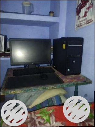 Black Flat Screen Computer Monitor And Keyboard