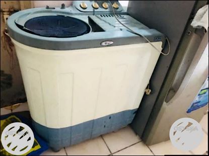 White And Black Front-load Clothes Washer