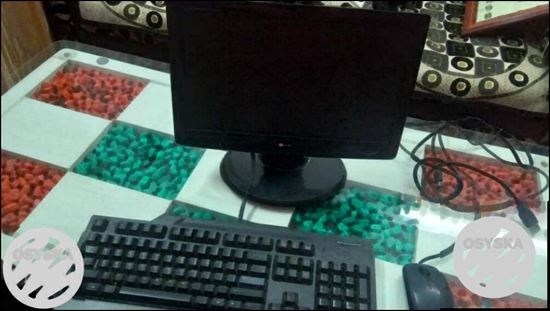 Black Flat Screen Computer Monitor And Keyboard